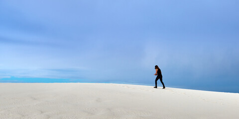 Woman exploring at White Sands National Park, NM