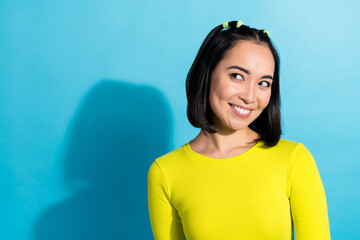 Closeup photo of young cute cheerful japanese lady smiling look dreamy empty space enjoy her boyfriend proposition isolated on blue color background