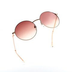 Sunglasses in flying isolated on white and grey background. Retro sunglasses summer woman fashion...
