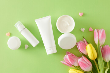 Natural cosmetic products concept. Top view photo of cosmetic tubes without label open cream jar...