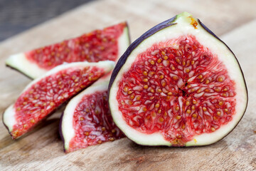 sliced ripe fresh purple figs, close up
