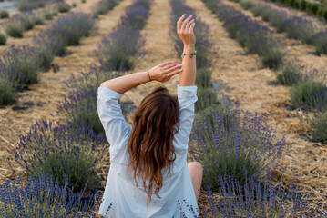 Happiness and joy concept, happy woman enjoy summer holidays in lavender flower fields
