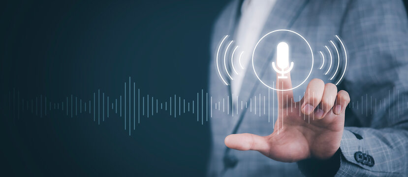 Business people Hand touch the microphone button on virtual screen. Blog speak talk advertising presentation, Voice recognition, speech detection and deep learning application, Voice Assistance