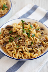 Homemade One Skillet Ground Beef Stroganoff with Mushrooms and Noodles on a Plate, side view.