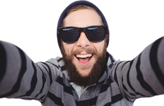 Portrait of happy hipster wearing sunglasses