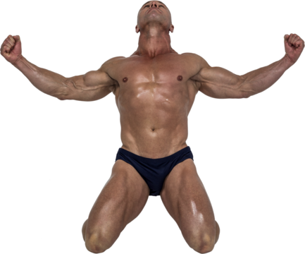 Muscular man kneeling down with arms outstretched