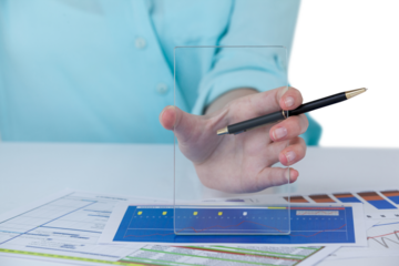 Businesswoman pretending to hold mobile phone