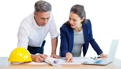 Female architect explaining blueprint to colleague