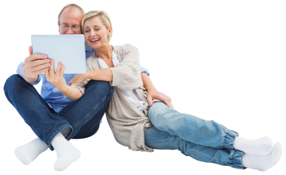 Happy mature couple using tablet pc - Powered by Adobe