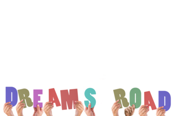 Cropped hands holding colorful words dreams road 