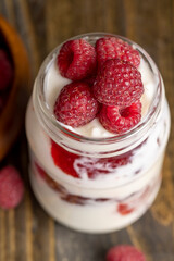 Fresh milk yogurt with whole fresh raspberries