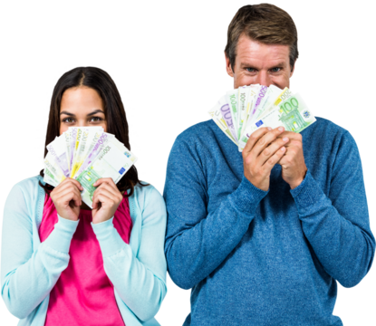 Portrait of couple hiding face with money