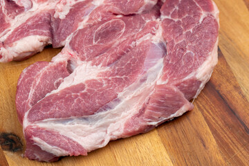 A cut piece of pork close up