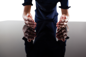 Businesswoman pretending to work on an invisible object