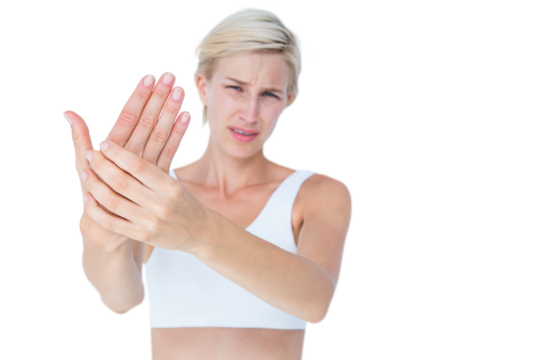 Pretty woman suffering from hand pain 