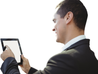 Side view of businessman using digital tablet