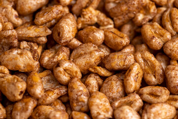 Grain wheat covered with a thin layer of chocolate
