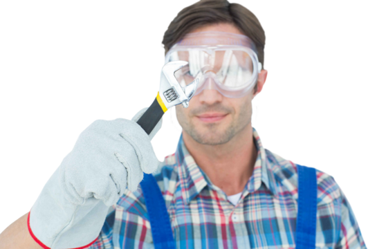 Plumber holding adjustable wrench - Powered by Adobe