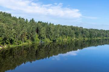 Fototapeta na wymiar Wide river in summer in sunny weather
