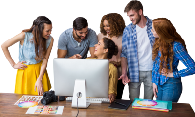 Cheerful usiness people discussing over computer at table