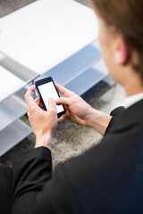 Businessman using smart phone