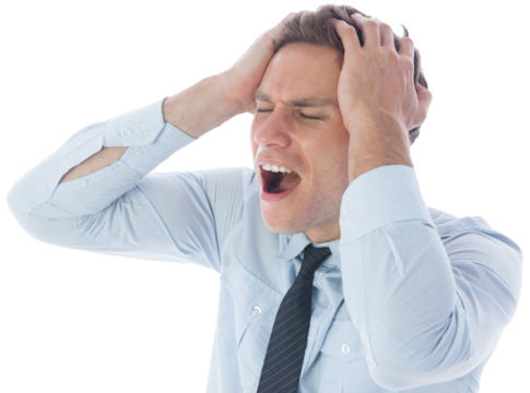 Stressed businessman with hands on head