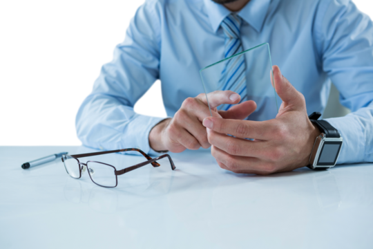 Midsection of businessman touching glass sheet