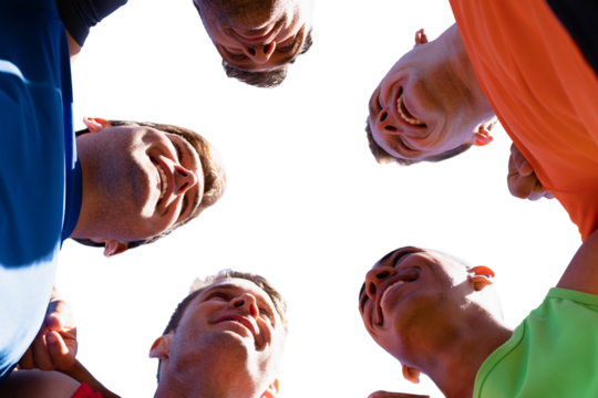 Sportsmen with arms around each other