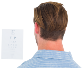 Focused man in suit on eye test letters