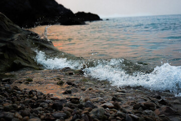 waves crashing on rocks