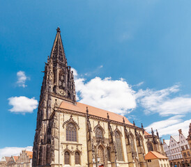 Fototapeta premium St. Lamberti - Roman Catholic church from below. St. Lamberti in Muenster. Town in North Rhine Westphalia, Germany, Europe
