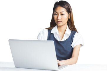 Concentrated businesswoman using a laptop