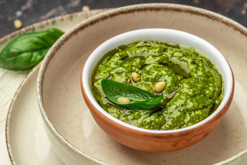 Pesto sauce cooking Basil, olive oil, parmesan, garlic, pine nuts. banner, menu, recipe place for text, top view