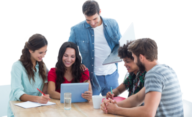 Creative business team gathered around a tablet