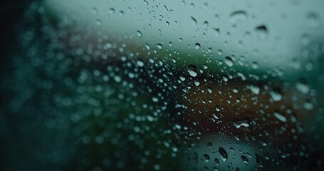 macro closeup water Raindrops sliding on the window glasses surface