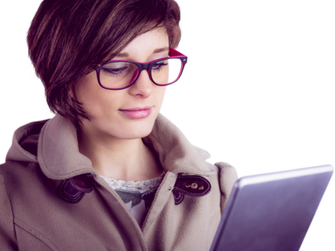 Beautiful woman in glasses using tablet computer - Powered by Adobe