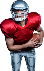 American football player holding ball