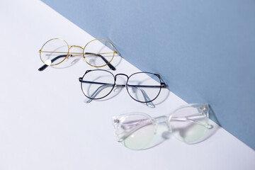 Glasses on a white and blue background