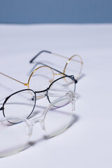 Glasses on a white and blue background