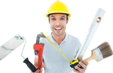Portrait of happy worker holding various equipment