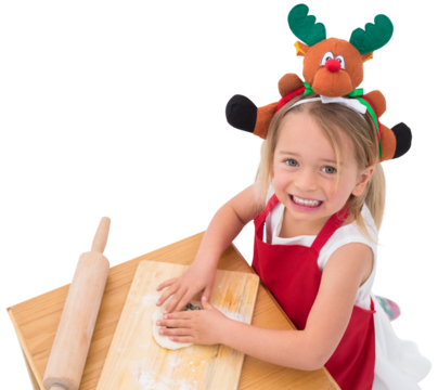 Festive little girl making cookies