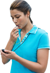 Sportswoman blowing whistle while holding stopwatch