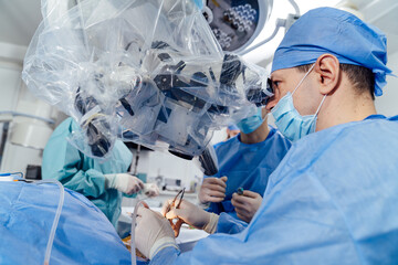 Neurosurgery modern hospital process. Professional doctors operating.