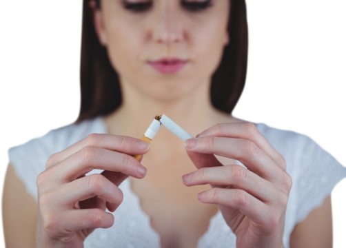 Woman snapping cigarette in half