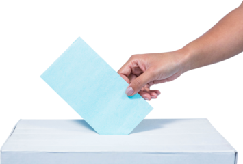 Woman putting ballot in vote box