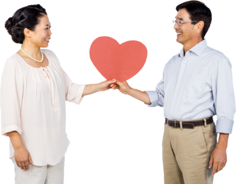 Older asian couple holding heart - Powered by Adobe