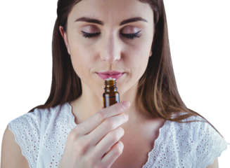 Woman taking alternative tincture