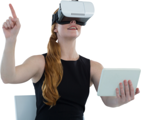 Female executive holding digital tablet while using virtual reality headset