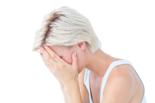 Sad blonde woman crying with head on hands - Powered by Adobe