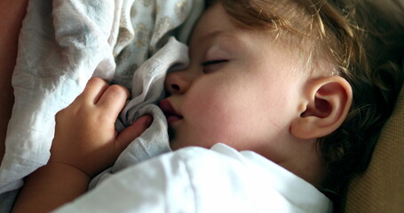 Obraz na płótnie Canvas Baby sleeping, close-up infant child toddler asleep